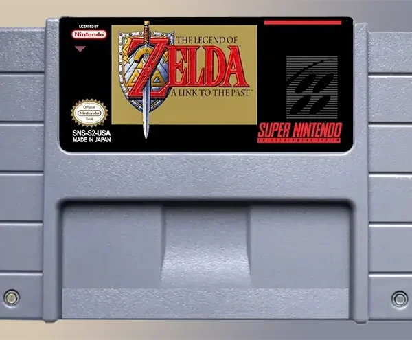 Cartucho Zelda: A Link to the Past original da Nintendo para SNES, na label do jogo (capa ) O simbolo Z no escudo de links, escrito o nome do game e fundo verde
